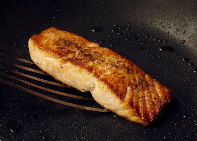Salmon in skillet with a nice sear