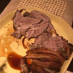 Bacon-Wrapped Leg of Lamb with Red Wine Reduction Recipe